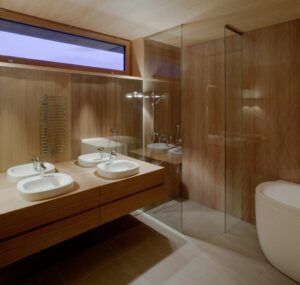 Badezimmerunterschrank aus Holz mit zwei Waschbecken